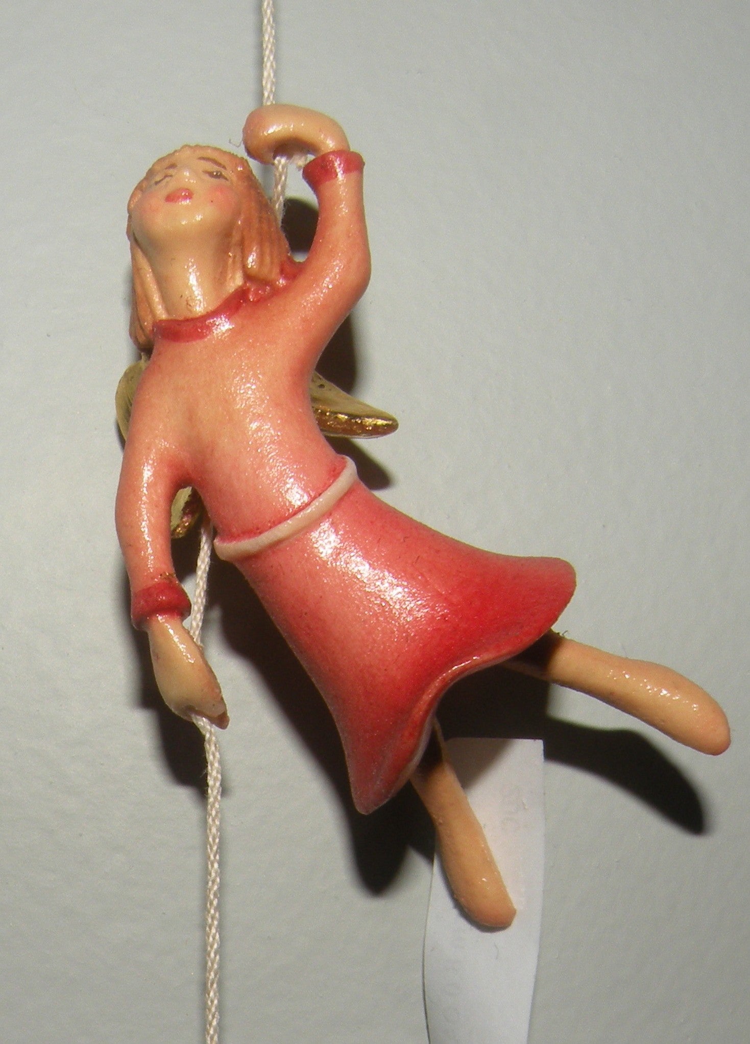 ( 2 angel ) Abseiling angel on the gable and Abseiling angel , Kastlunger