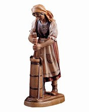 Woman making butter, Rustic