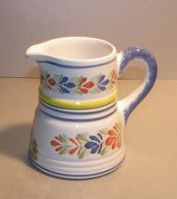 Rustic pitcher , Henriot Man