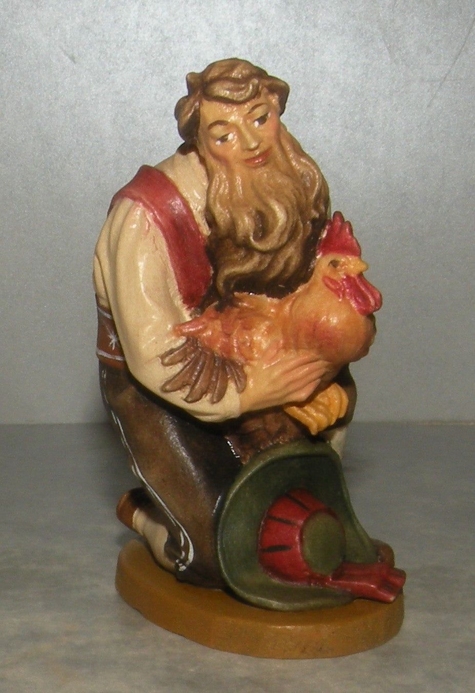 Shepherd kneeling with cock, Folkloristic