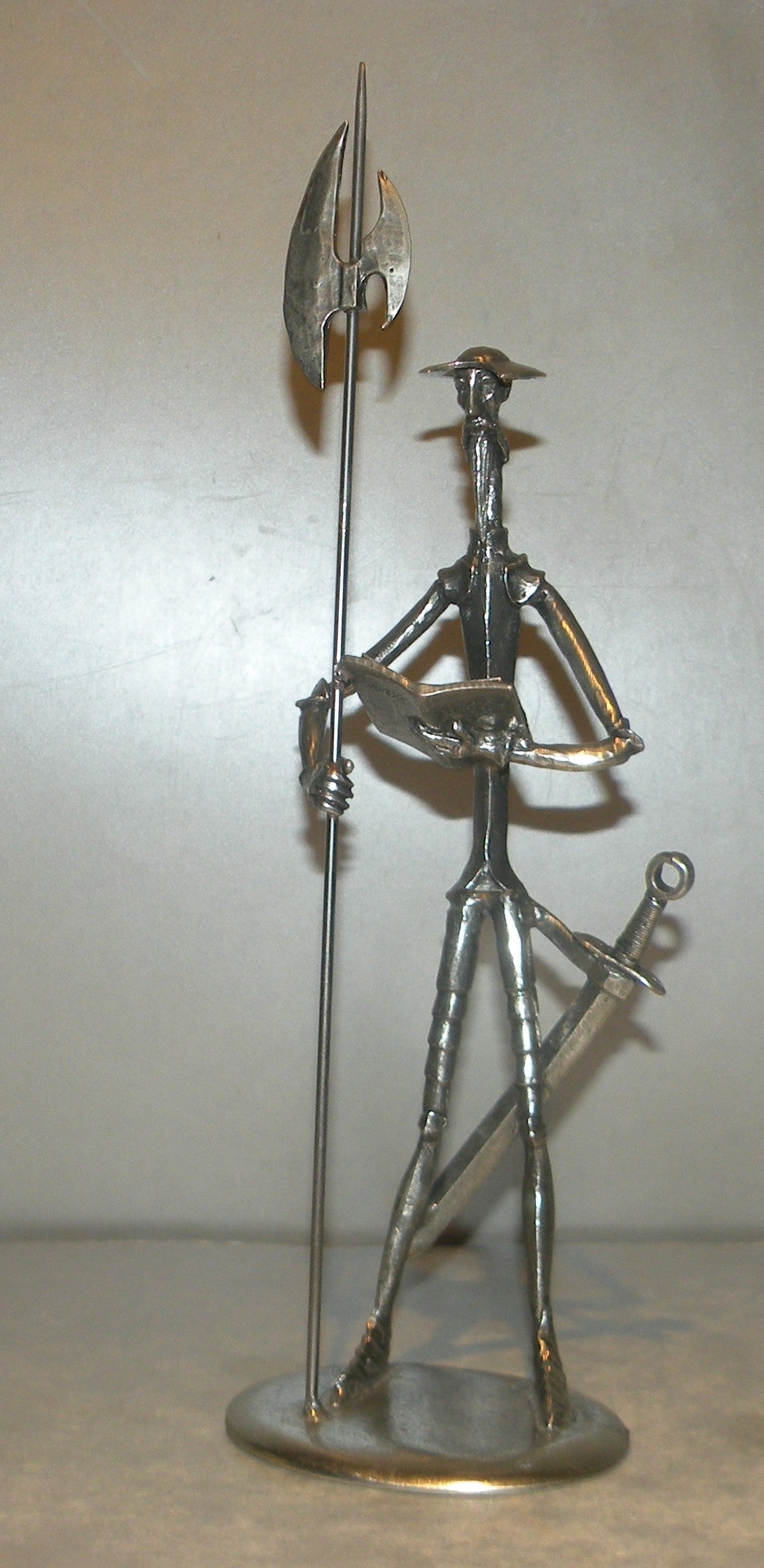 Medium Don quichotte with book