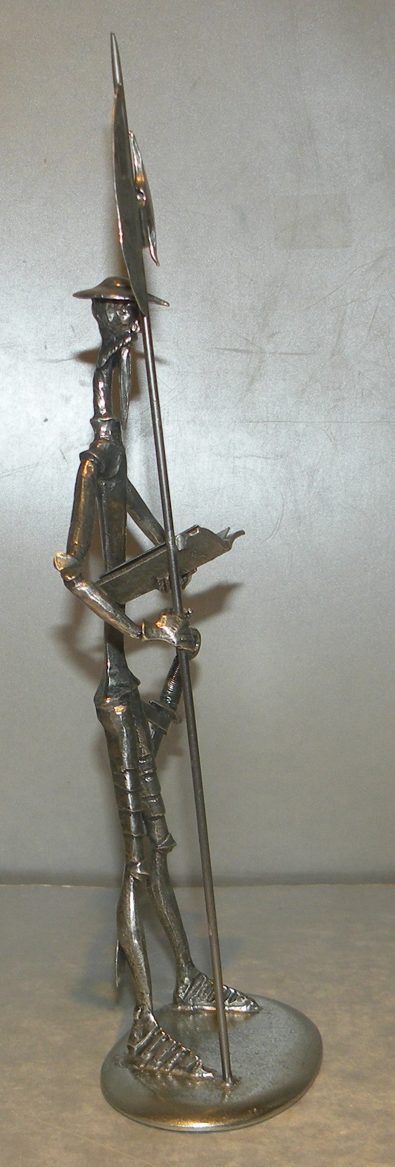 Medium Don quichotte with book
