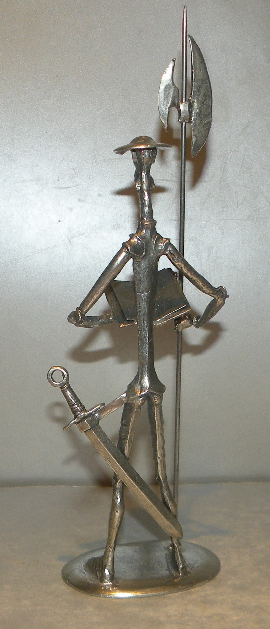 Medium Don quichotte with book