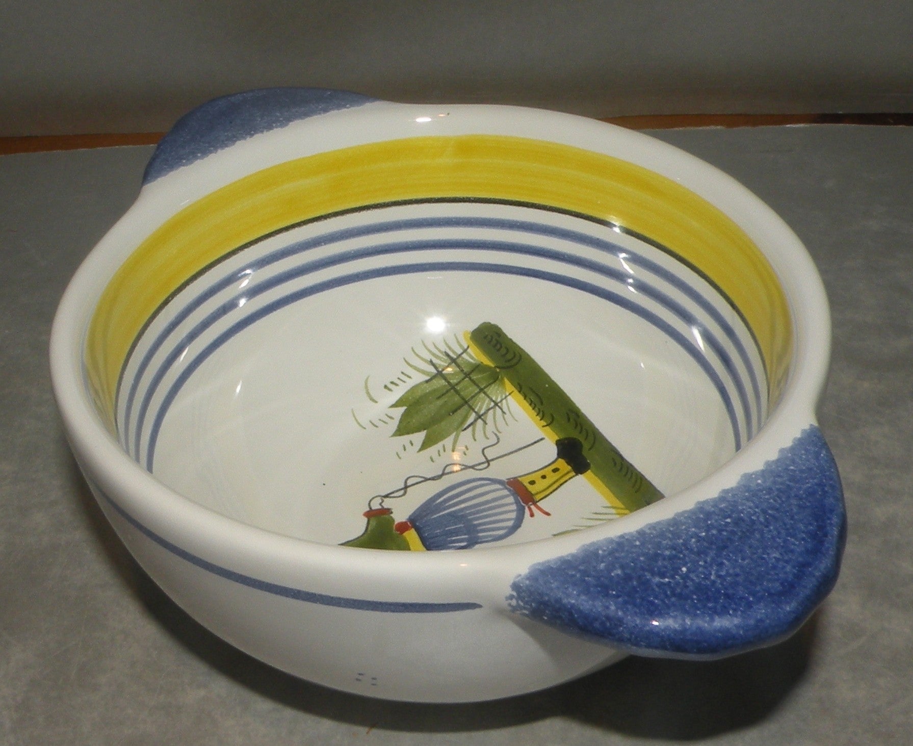 Breton lug bowl with a man, Henriot