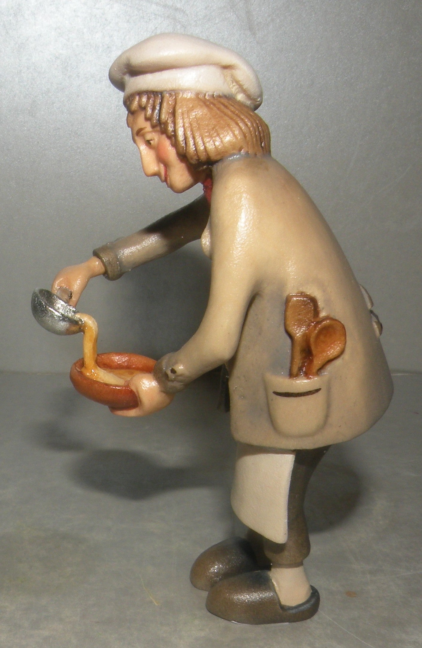 Cook with ladle and soup, Kastlunger