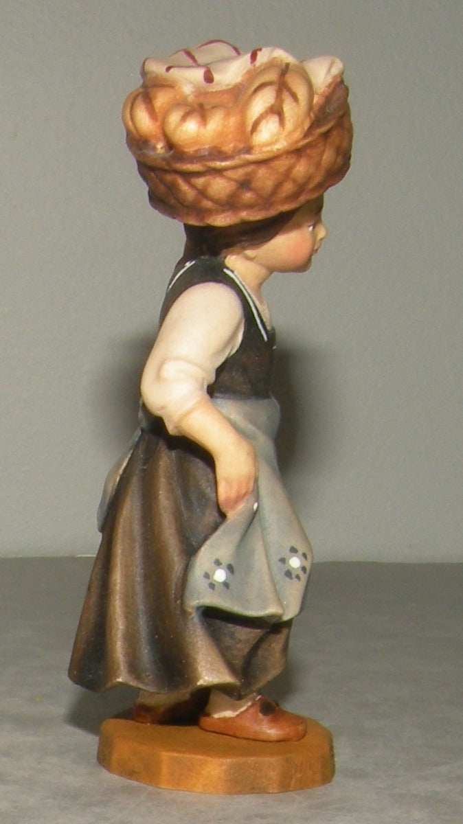 Child with bread basket, Rustic