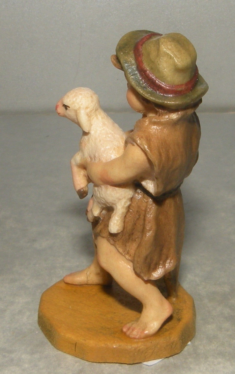 Child with lamb, Rustic