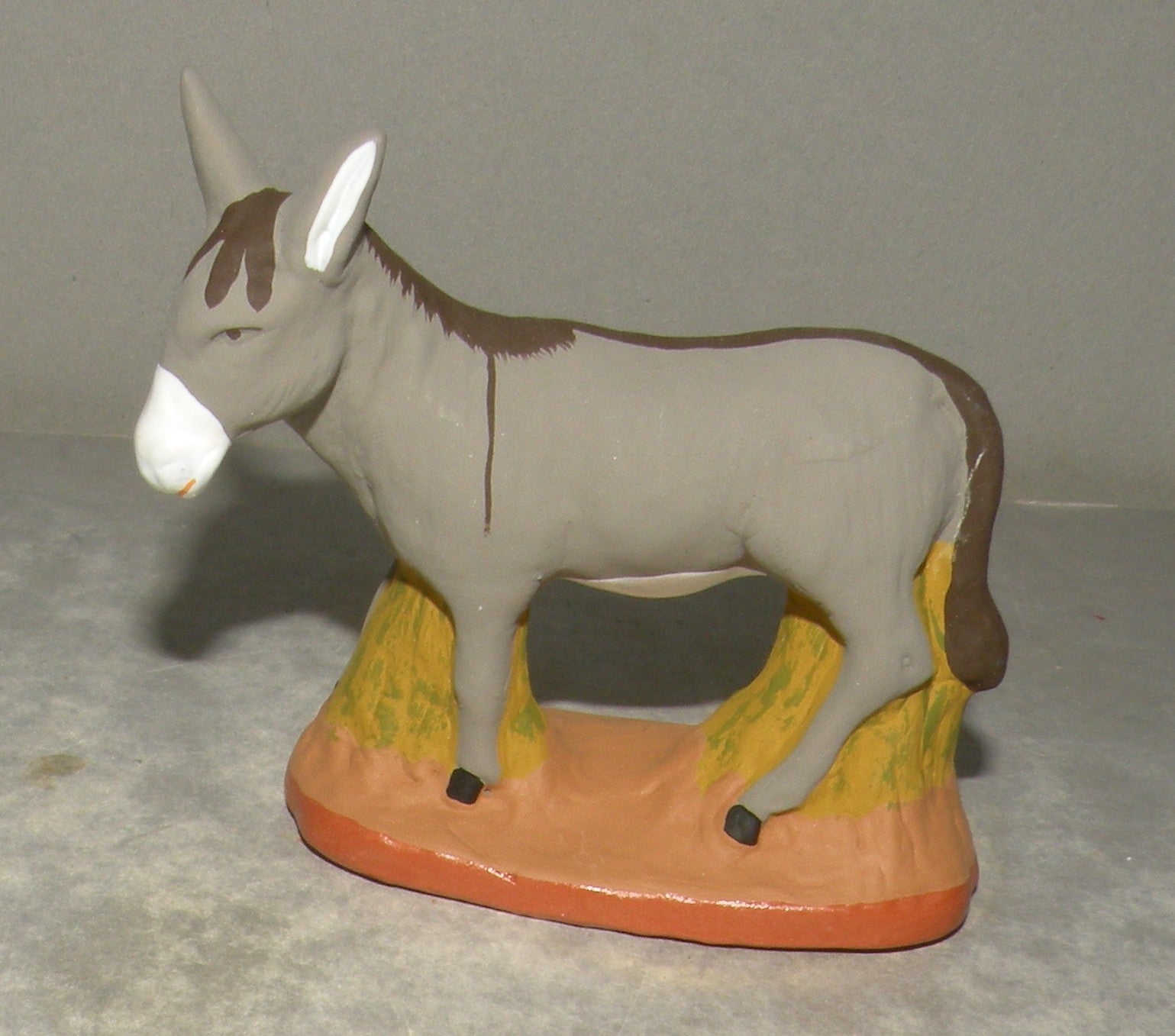 Donkey standing on grass , ( 464 )  Fouque, 9 cm
