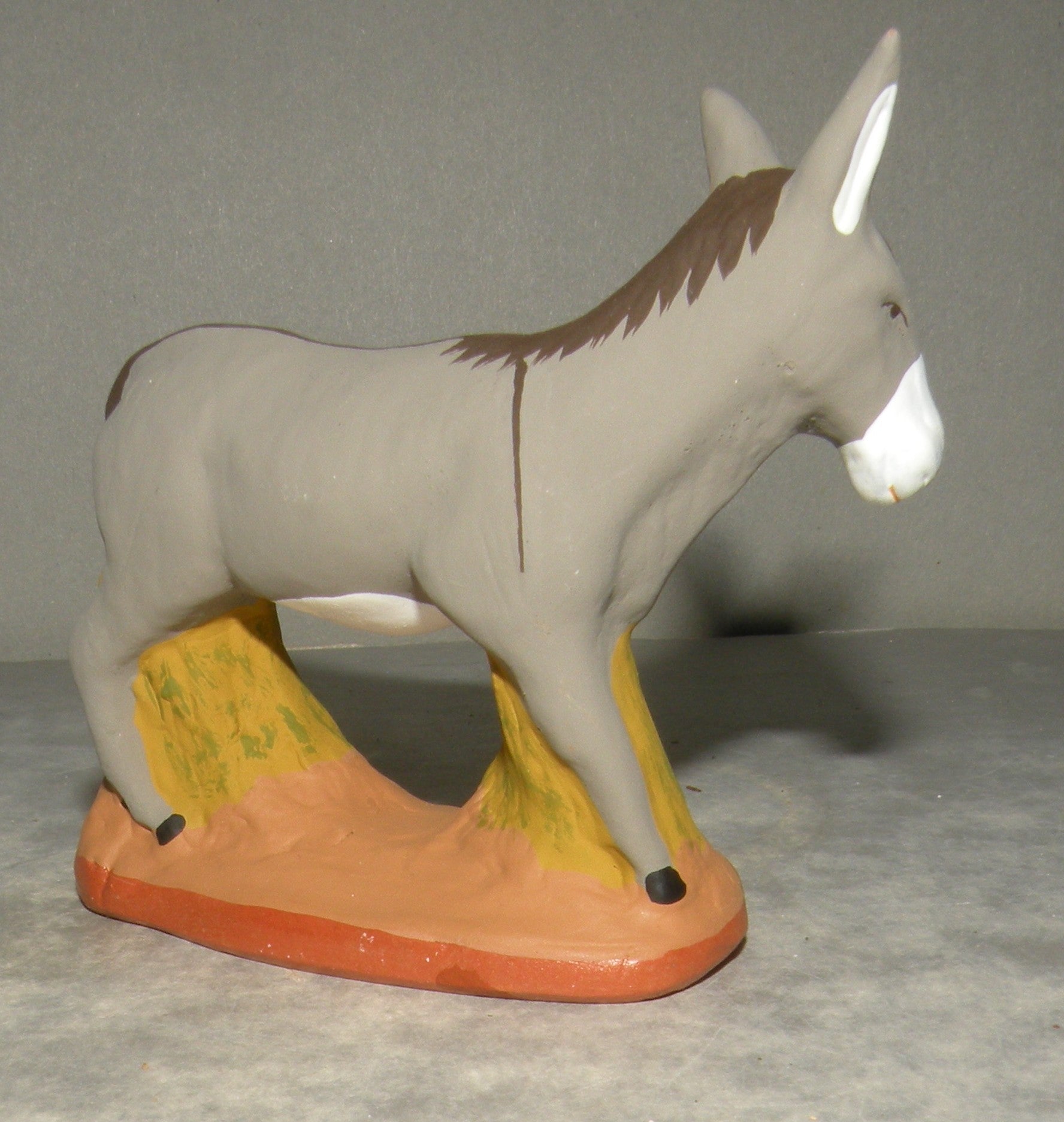 Donkey standing on grass , ( 464 )  Fouque, 9 cm