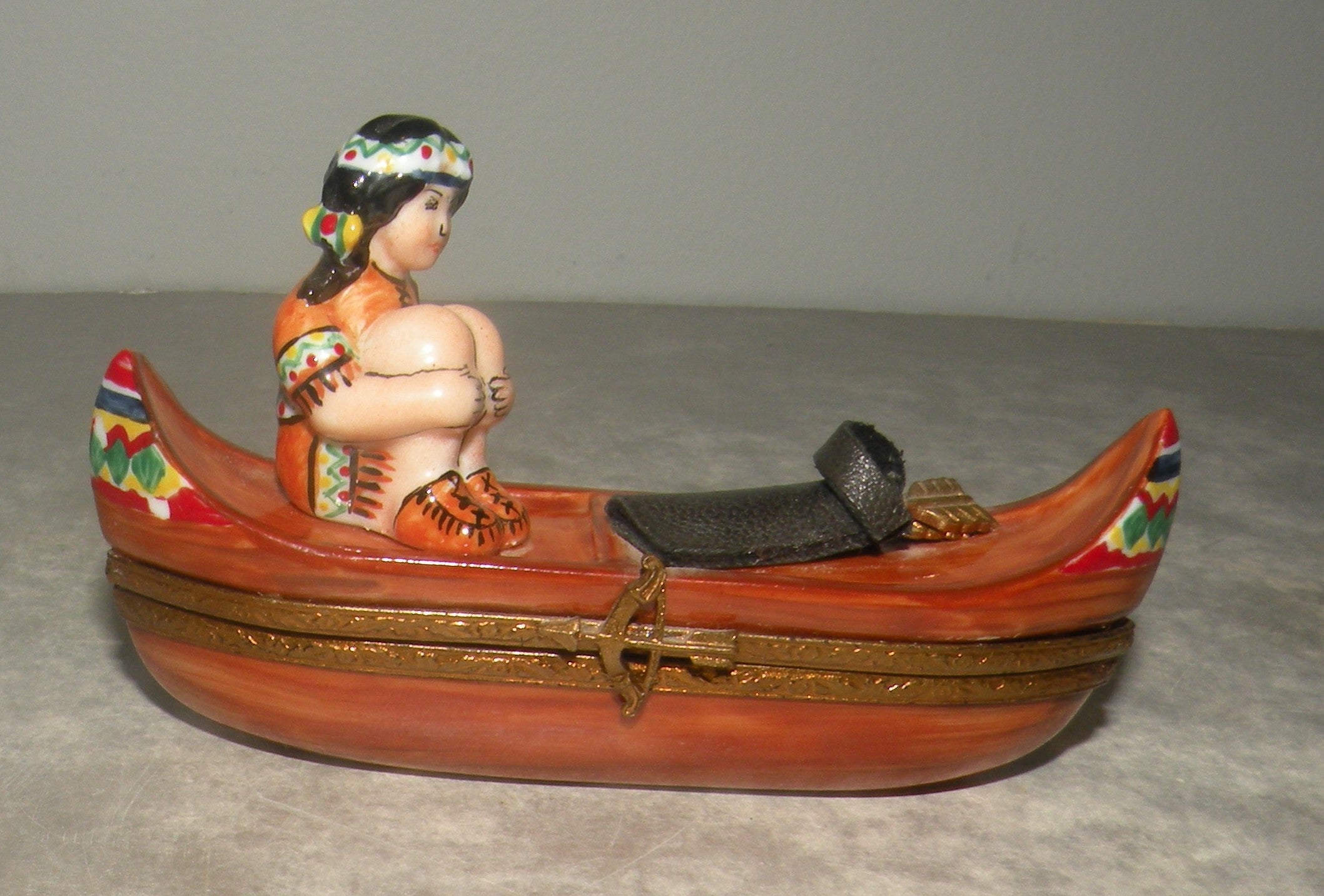 Indian woman on a canoe , Limoges Box number 22