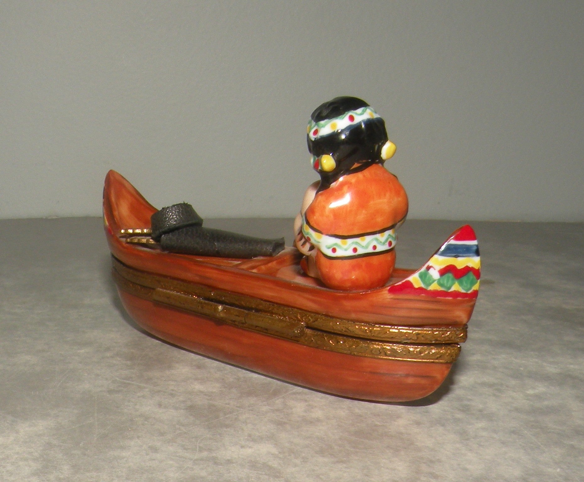 Indian woman on a canoe , Limoges Box number 22