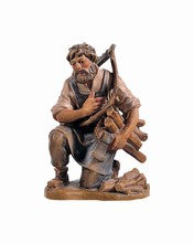 Wood-cutter kneeling, Rustic