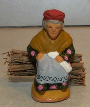 Old woman seated on firewood,  Fouque, 4 cm