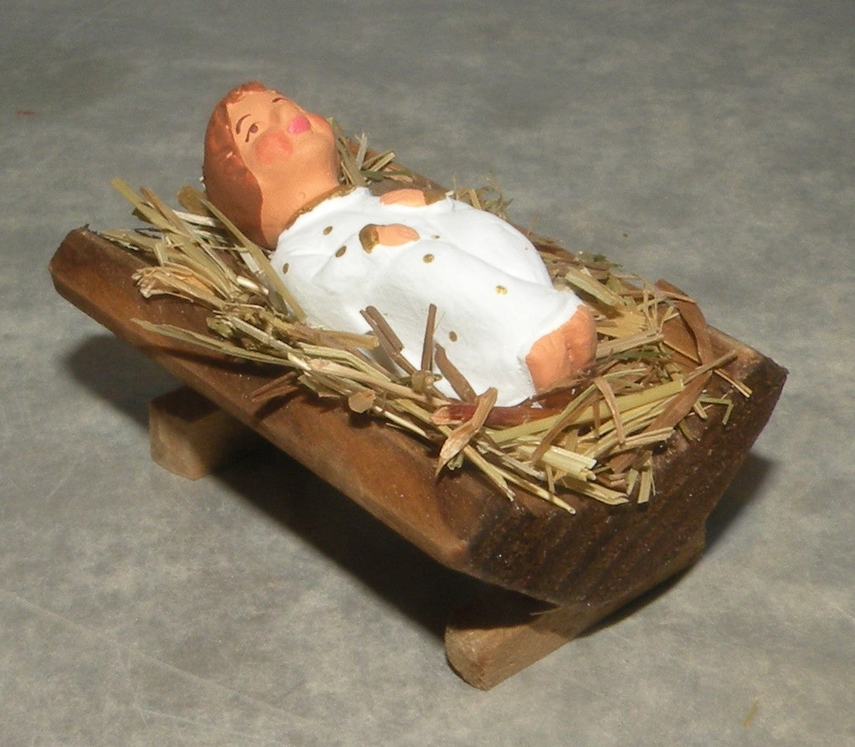 Jesus on straw in wooden cradle, Didier, 7 cm