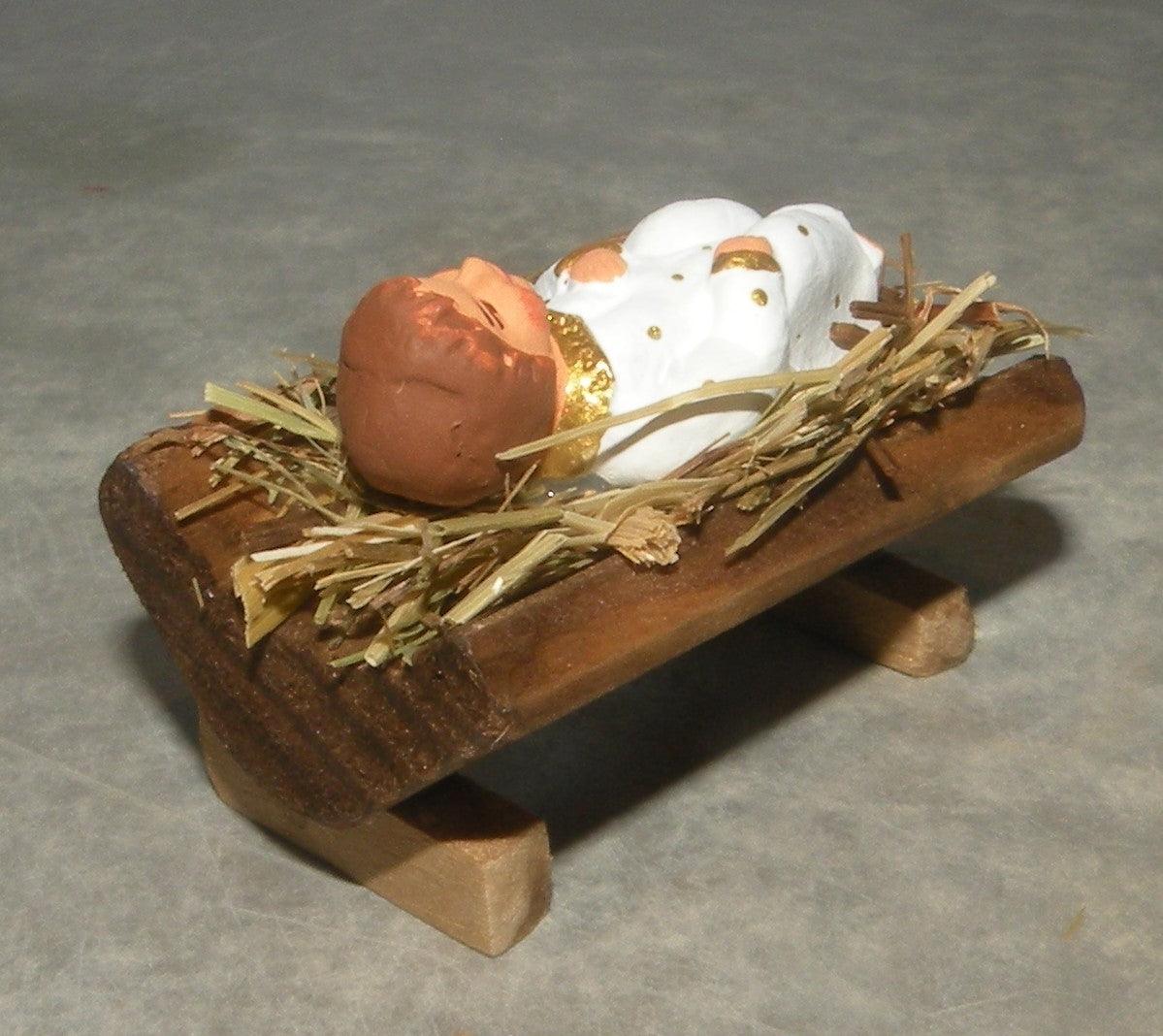 Jesus on straw in wooden cradle, Didier, 7 cm