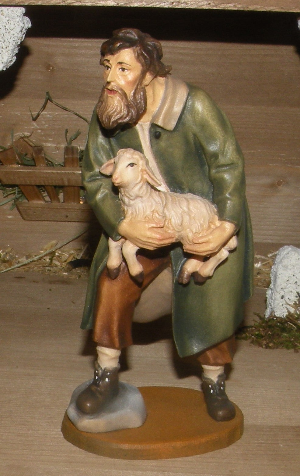 Shepherd with lamb , Reindl