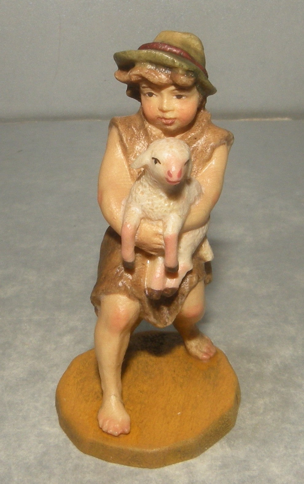 Child with lamb, Rustic