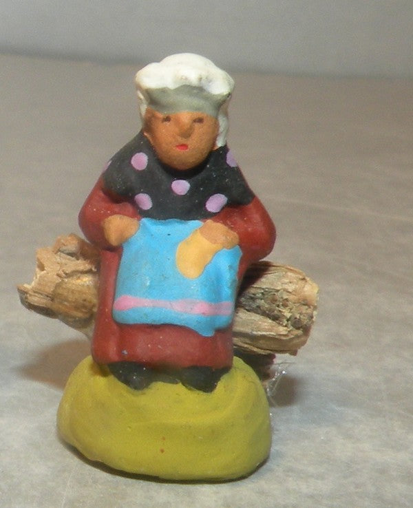 Old woman seated on firewood, Fouque 2cm